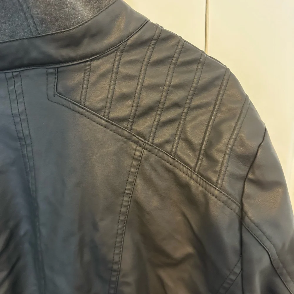 Plus size, faux black leather jacket with attached gray hoodie lining. Size 2x - Picture 7 of 9